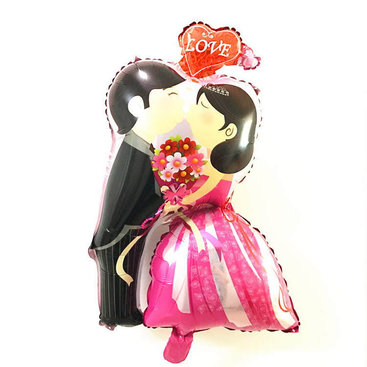 Kiss bride and groom foil balloons for wedding favor